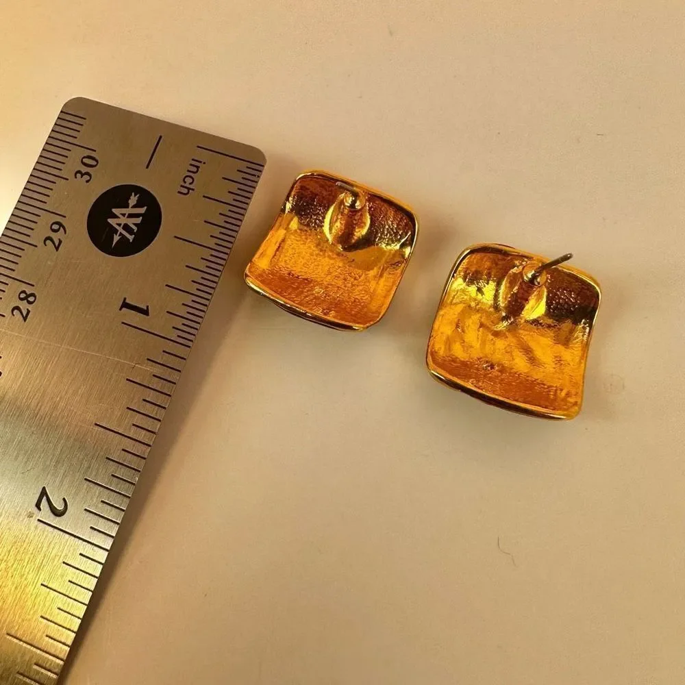 Gold tone and black square post earrings
